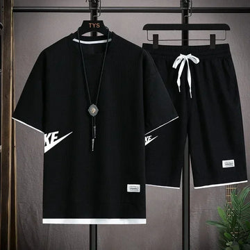 Men's casual sportswear, Korean short-sleeved shirt + capmi pants, two-piece set, new summer collection of 2025